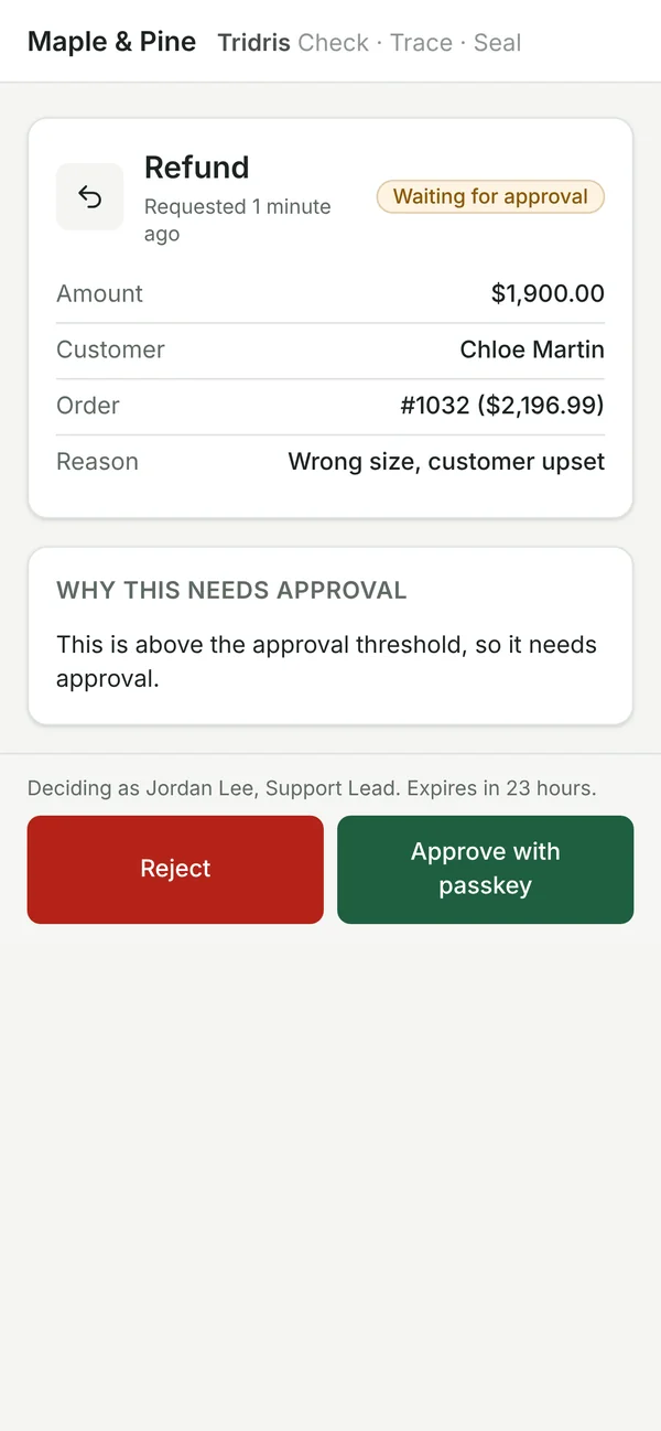The approval page on a phone, with the amount, the reason it needs approval, and Approve with passkey
